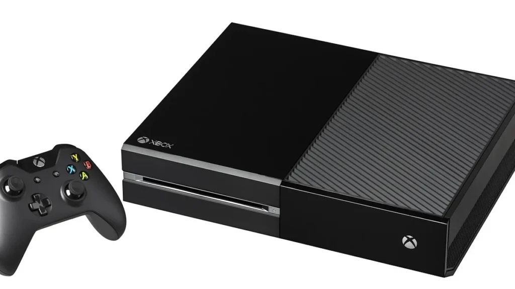 A black Xbox One console and its matching wireless controller are displayed against a clean white background.