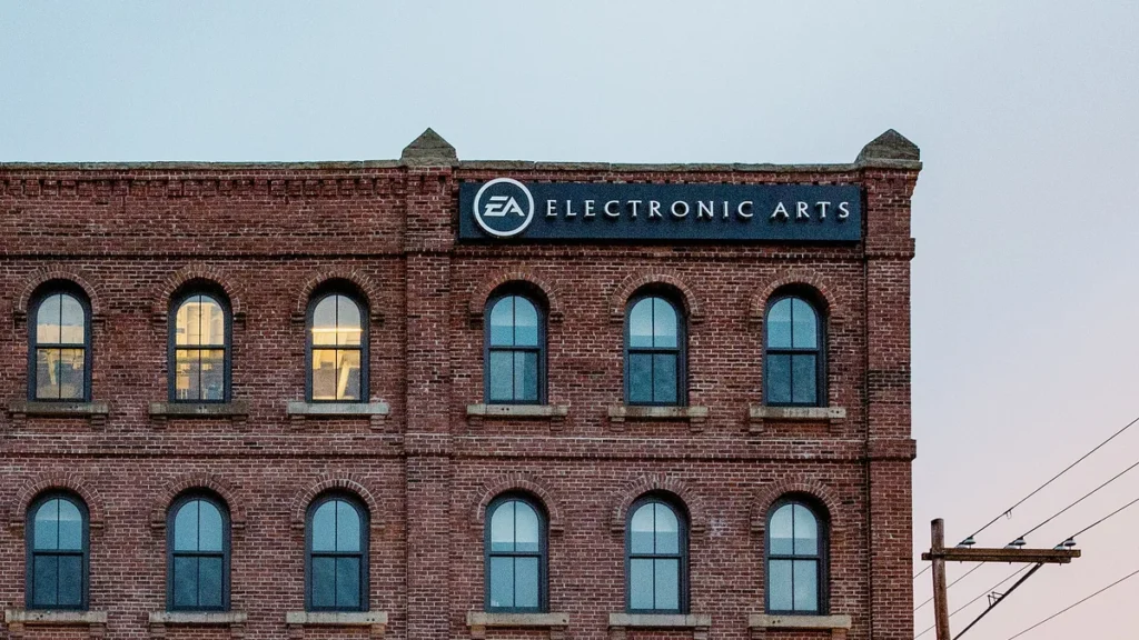 A red brick building with the Electronic Arts logo sign mounted on the upper facade.