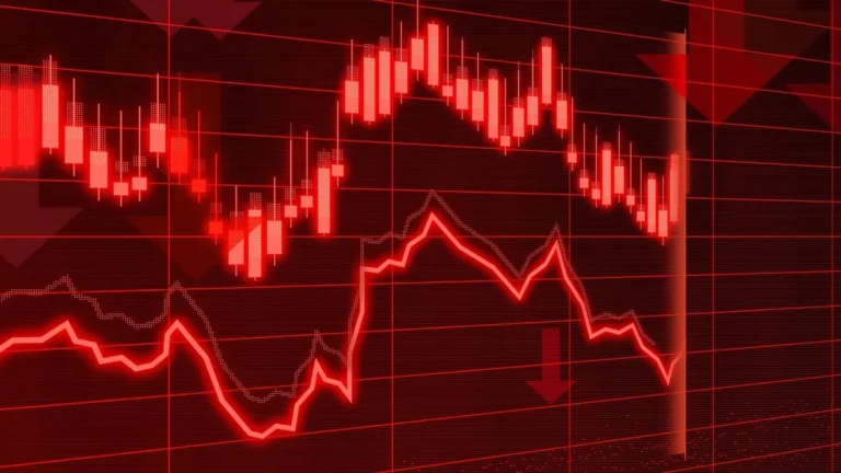 A red glowing candlestick chart and line graph depicting a sharp downward financial trend.