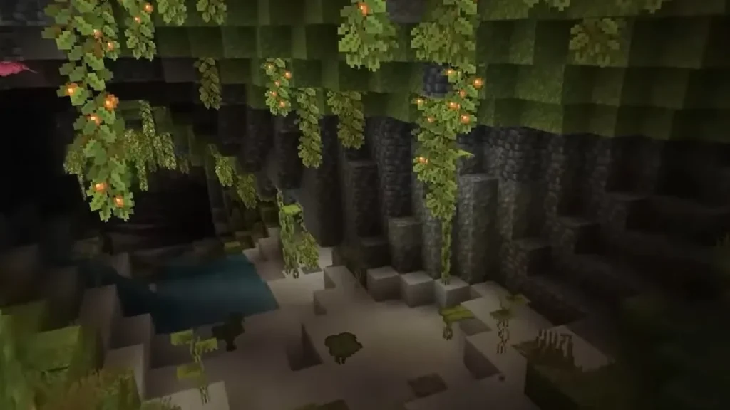 Minecraft cave scene with hanging vines, glowing berries, and soft lighting showcasing vibrant visual effects.