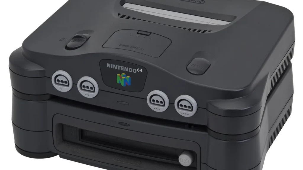 Nintendo 64 console with 64DD attachment, showing four controller ports and the colorful Nintendo 64 logo.