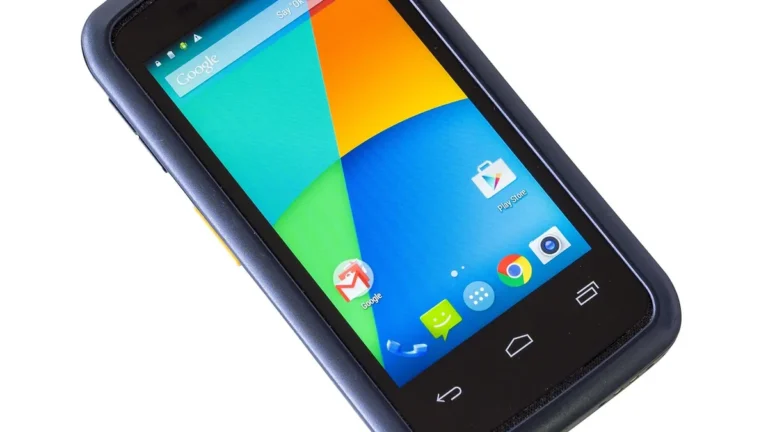 Close-up of an Android smartphone displaying a colorful home screen with standard Google app icons.